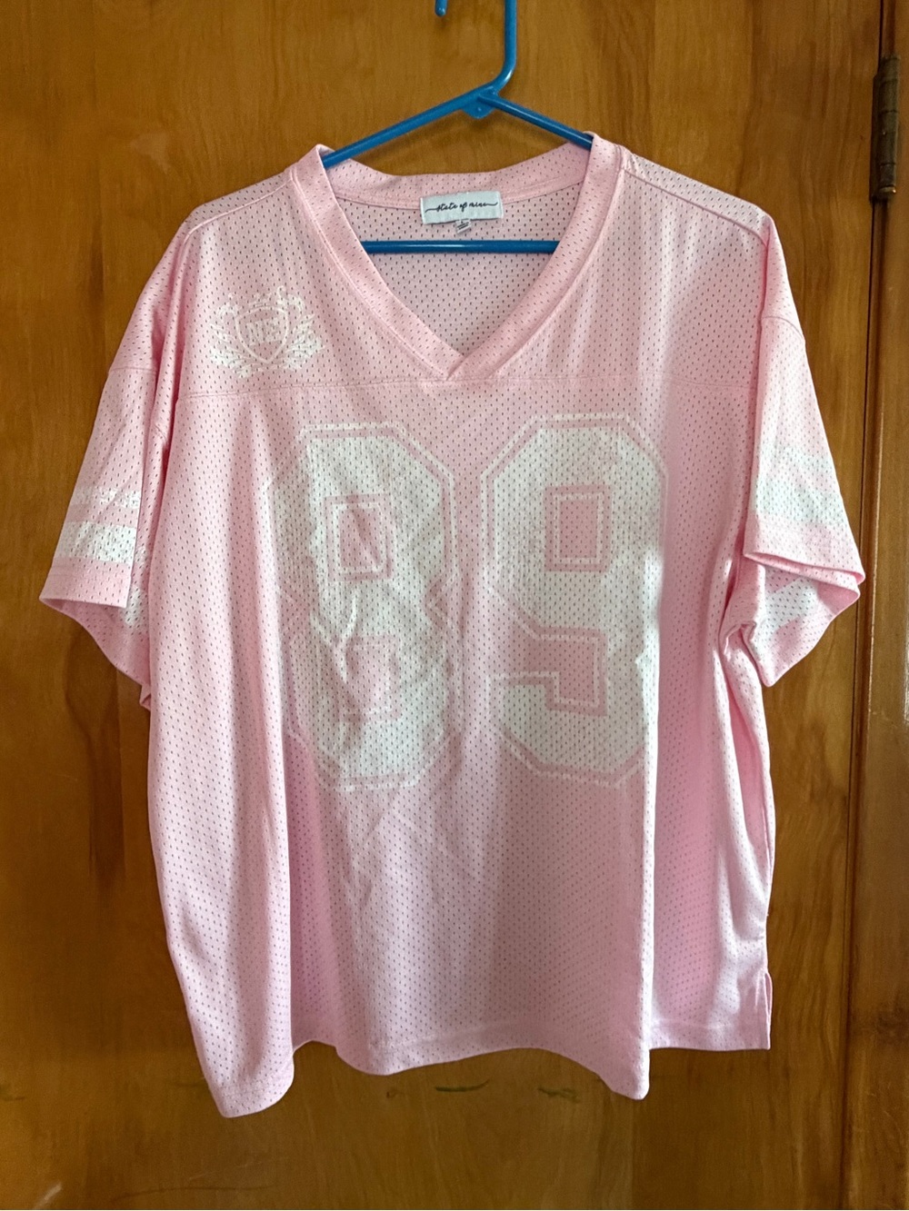 Light Pink Mesh Nebraska Jersey Top with White '89' Graphic
